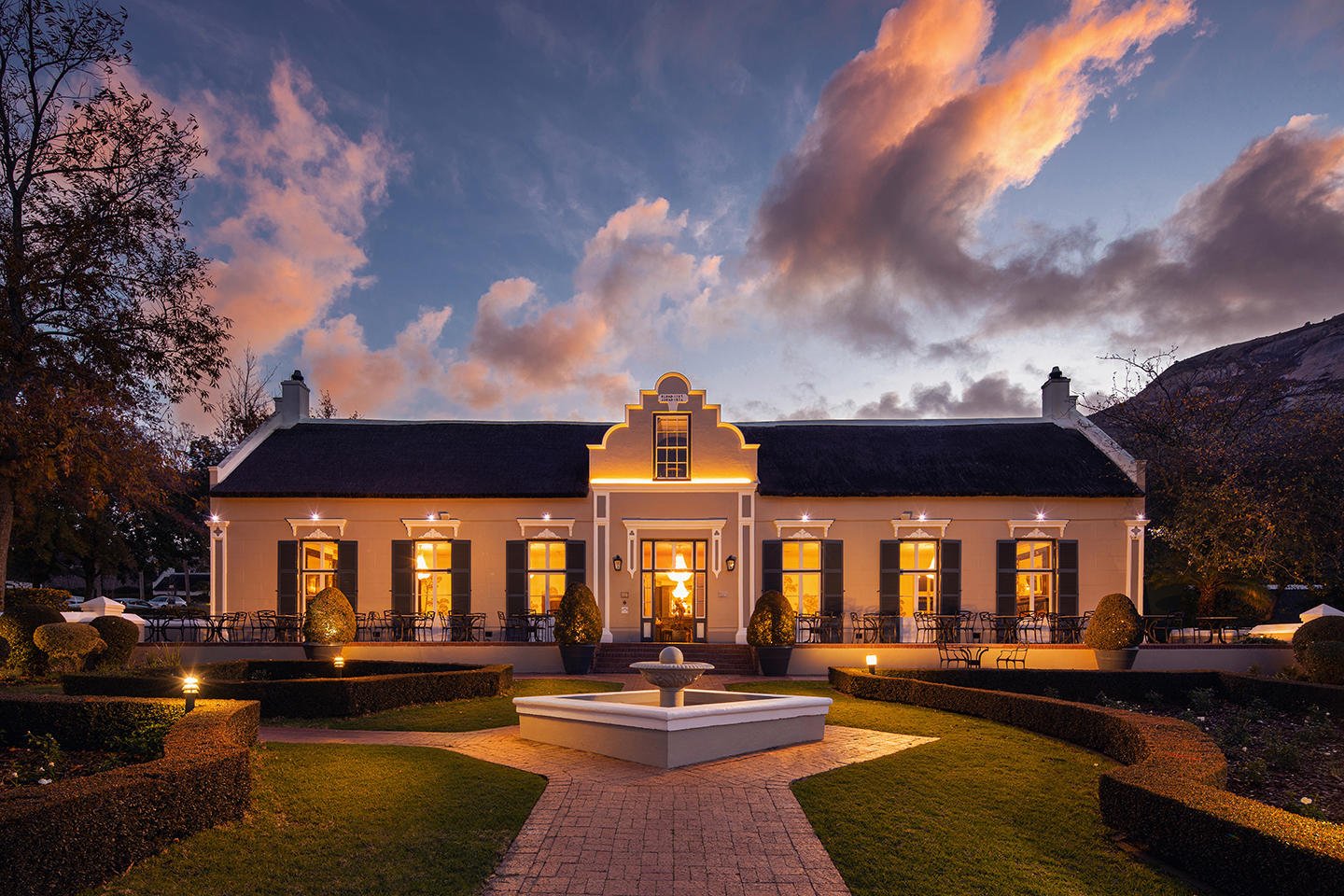 Grande Roche Hotel Paarl Südafrika Manor House in Abenddämmerung