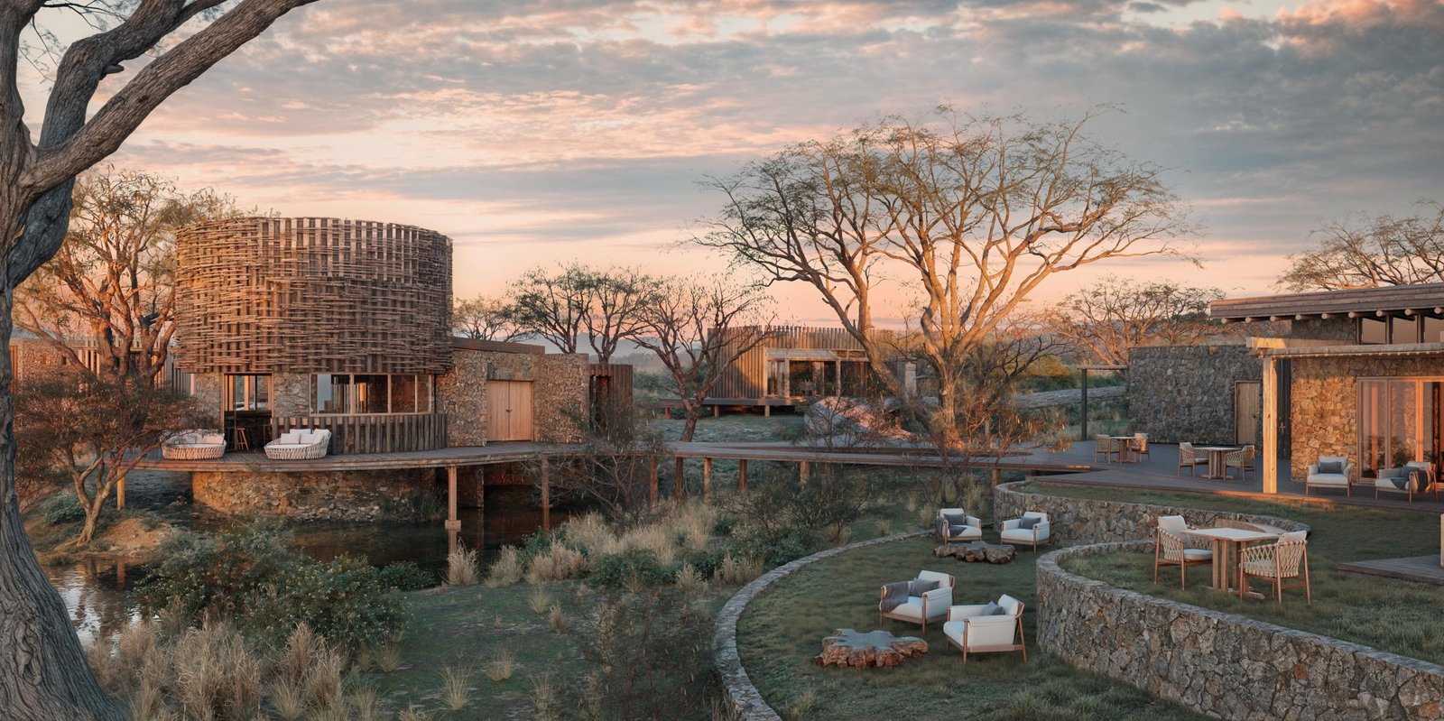 Umgebung der Lodge mit verschiedenen Gebäuden und Sitzmöglichkeiten draussen